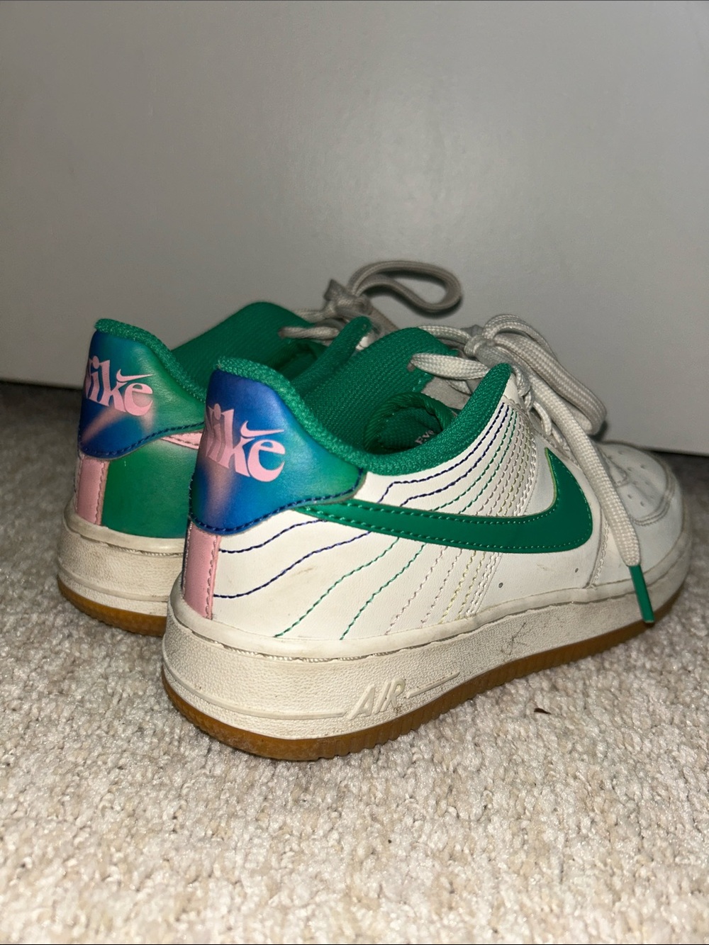 Nike Kids White Sneakers with Green Swoosh and Pink/Blue Heel